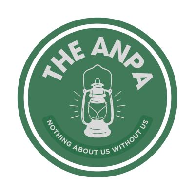 the ANPA logo is a green circle with a kerosene lantern in the middle. The letter ANPA are above the lantern, below is written "nothing about us without us".